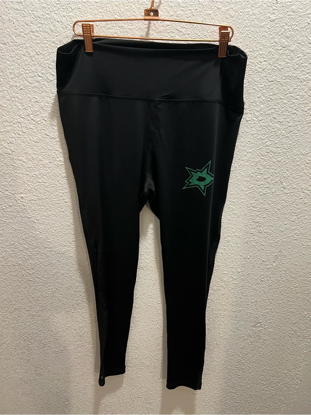 NHL Black Leggings with Green Star Logo
